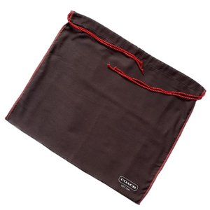 Coach dust cover for handbag, 15" x 13", brown with red drawstrings